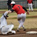 Soldotnas Wyatt Gagnon slides safely into third behind Gabe Joanis at the Division II state baseball tournament at Coral Seymour Memorial Park in Kenai, Alaska, on Saturday, June 7, 2025. (Photo by Jeff Helminiak/Peninsula Clarion)