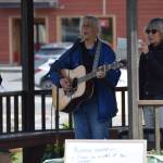 Cindy McKenna performs her song, Its My Flag Too, on Friday, June 6, 2025, at WKFL Park in Homer, Alaska. (Chloe Pleznac/Homer News)