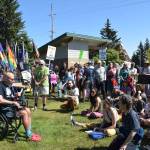 Homer senior George Faust addresses the assembled crowd of Pride celebrants and No Kings protesters on Saturday, June 14 at WKFL Park in Homer, Alaska. (Chloe Pleznac/Homer News)