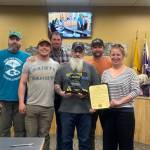 During the Homer City Council meeting on Monday, June 9, 2025, Homer mayor Rachel Lord recognizes staff members of the City of Homer wastewater treatment facility for winning the Large Wastewater System of the Year award at a state conference in Anchorage earlier in June. (Photo courtesy of Melissa Jacobsen)