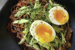 Bibim guksu or mixed noodles, are traditionally served with a thin wheat flour noodle called somyeon (somen). (Photo by Tressa Dale/Peninsula Clarion)