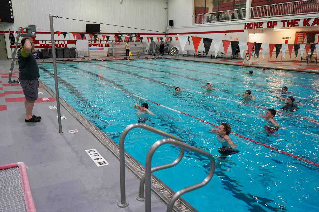 Pool manager and swim coach Will Hubler leads a treading water exercise at Kenai Central High School in Kenai, Alaska, on Tuesday, June 17, 2025. (Jake Dye/Peninsula Clarion)