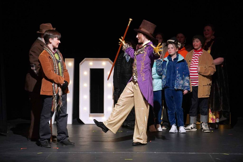 The cast of Seward High School Theatre Collectives "Charlie and the Chocolate Factory" rehearse on Thursday, April 3, 2025. (Jake Dye/Peninsula Clarion)