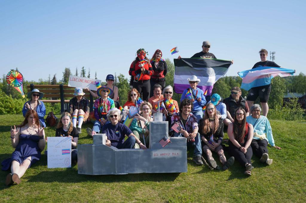 Pride celebrants pose for a photo at Soldotna Creek Park in Soldotna, Alaska, on Saturday, June 14, 2025. (Jake Dye/Peninsula Clarion)