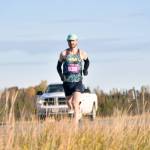 Kenais Jason Parks runs to a win in the mens marathon at the Kenai River Marathon on Sunday, Sept. 29, 2024, in Kenai, Alaska. (Photo by Jeff Helminiak/Peninsula Clarion)