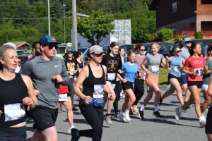 Runners start from Homer High School during the Homer Spit Run 10K to the Bay on Saturday, June 28, 2025, in Homer, Alaska. (Delcenia Cosman/Homer News)