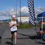 Seamus McDonough crosses the finish line near Lands End Resort, taking first place in the mens category for the Homer Spit Run 10K to the Bay on Saturday, June 28, 2025, in Homer, Alaska. (Delcenia Cosman/Homer News)