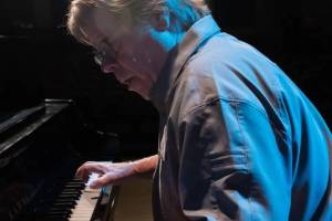 Johnny B performs at his piano in this undated photograph. (Photo courtesy of John Bushell)