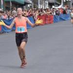 Palmers Denali Strabel, 35, finishes the womens race at the Mount Marathon Race on July 4, 2025, in Seward, Alaska. (Photo by Jeff Helminiak/Peninsula Clarion)