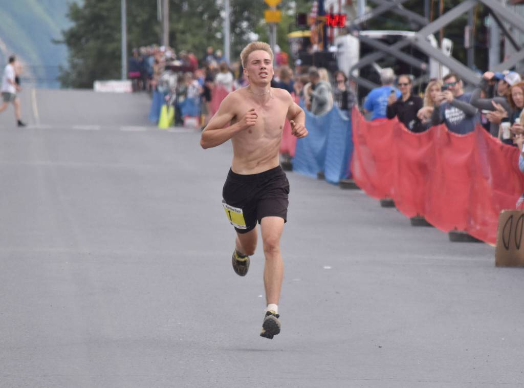 Anchorages Vebjorn Flagstad, 17, wins the junior boys race at the Mount Marathon Race on July 4, 2025, in Seward, Alaska. (Photo by Jeff Helminiak/Peninsula Clarion)