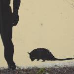 Grubby stares out from a corner of the mural on July 2. She was added to the mural by Reed in 2024, after a vandal snuck a sticker of the unofficial, beloved Homer mascot on the wall. (Chloe Pleznac/Homer News)