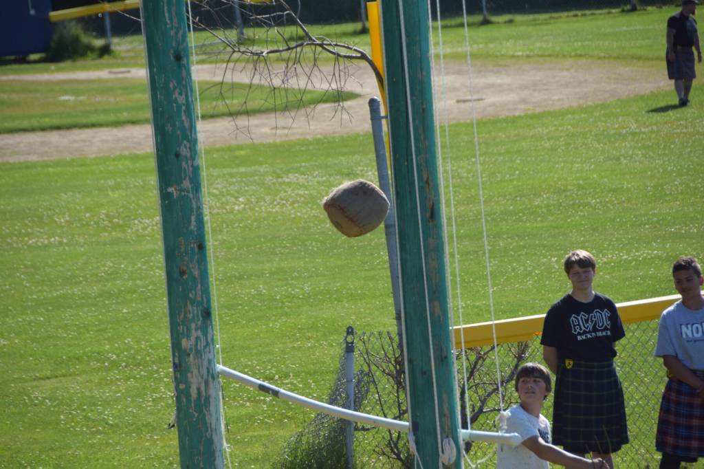 A young athlete throws during the 2025 Kachemak Bay Highland Games on July 5 at Karen Hornaday Park. (Chloe Pleznac/Homer News)
