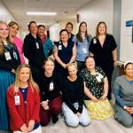 Members of the SPH Long Term Care staff pause for a moment of recognition. (Photo courtesy of South Peninsula Hospital)