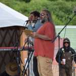 KBBI AM 890 general manager Josh Krohn thanks Concert on the Lawn sponsors on Saturday, July 12, 2025, at Karen Hornaday Park in Homer, Alaska. (Delcenia Cosman/Homer News)