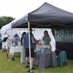 Kachemak Bay Family Planning Clinic is one of more than a dozen vendors at the Concert on the Lawn Saturday, July 12, 2025, at Karen Hornaday Park in Homer, Alaska. (Delcenia Cosman/Homer News)