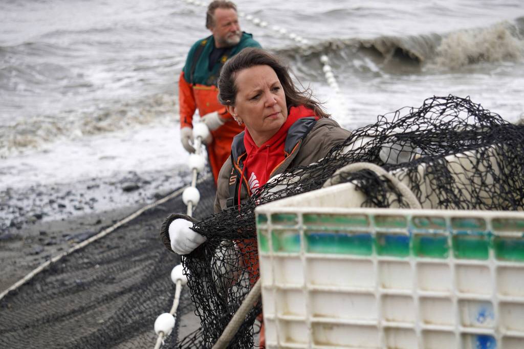 Lisa Gabriel unfurls a set beach seine during a test fishery for the gear near Clam Gulch, Alaska, on Wednesday, July 9, 2025. (Jake Dye/Peninsula Clarion)
