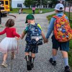 Children are photographed outside their now shuttered school, Pearl Creek Elementary, in August 2024 in Fairbanks, Alaska. (Photo provided by Morgan Dulian)