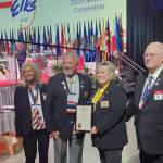 ASEA State President Tom Stroozas, PER, and Exalted Ruler Jill Hockema, PER, accept the award at the Elks Grand Lodge National Convention in Kansas City, Missouri on July 1. (Photo courtesy of Jill Hockema)