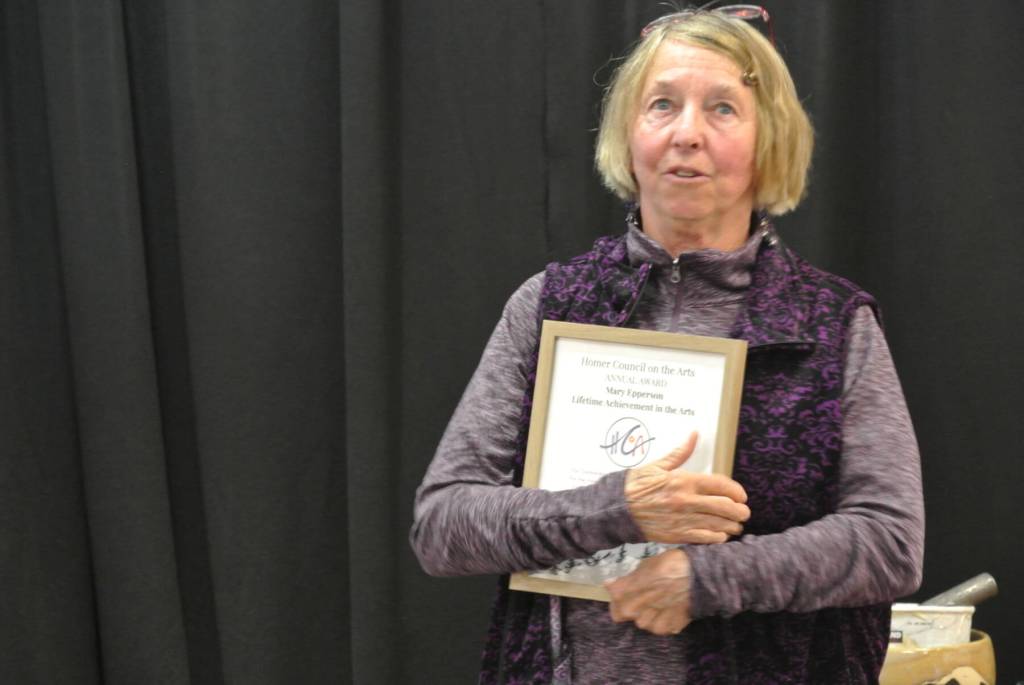 Jill Berryman speaks after being awarded the Mary Epperson Lifetime Achievement Award at Homer Council on the Arts annual Community Arts Award Ceremony on Saturday, July 19, 2025, in Homer, Alaska. (Delcenia Cosman/Homer News)