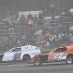 Martin Flora leads Jerry Parsons on the way to winning the Modified Dirty 30 on Saturday, July 19, 2025, at Twin City Raceway in Kenai, Alaska. (Photo by Jeff Helminiak/Peninsula Clarion)