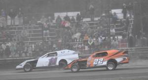 Martin Flora leads Jerry Parsons on the way to winning the Modified Dirty 30 on Saturday, July 19, 2025, at Twin City Raceway in Kenai, Alaska. (Photo by Jeff Helminiak/Peninsula Clarion)