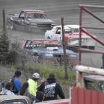 Jimmie Hale leads Jake Savely and Michael Hiatt in the A Stock feature at the Modified Dirty 30 on Saturday, July 19, 2025, at Twin City Raceway in Kenai, Alaska. Savely passed Hale midway through the race for the win. (Photo by Jeff Helminiak/Peninsula Clarion)