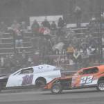 Martin Flora leads Jerry Parsons on the way to winning the Modified Dirty 30 on Saturday, July 19, 2025, at Twin City Raceway in Kenai, Alaska. (Photo by Jeff Helminiak/Peninsula Clarion)