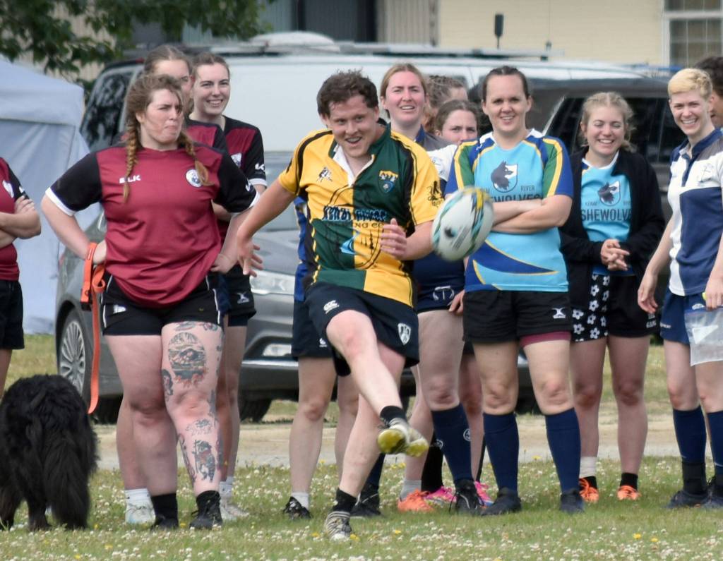 Paul Melin of Anchorage kicks a conversion following a try for the Kenai River Wolfpack at the Kenai Dipnet Fest Rugby 10s Tournament at Kenais Millennium Square on Saturday, July 19, 2025. (Photo by Jeff Helminiak/Peninsula Clarion)