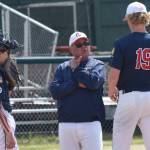 American Legion Post 20 Twins head coach Robb Quelland talks with catcher Ari Miller and pitcher Jacob Joanis during a game against West on Friday, June 13, 2025, at Coral Seymour Memorial Park in Kenai, Alaska. (Photo by Jeff Helminiak/Peninsula Clarion)
