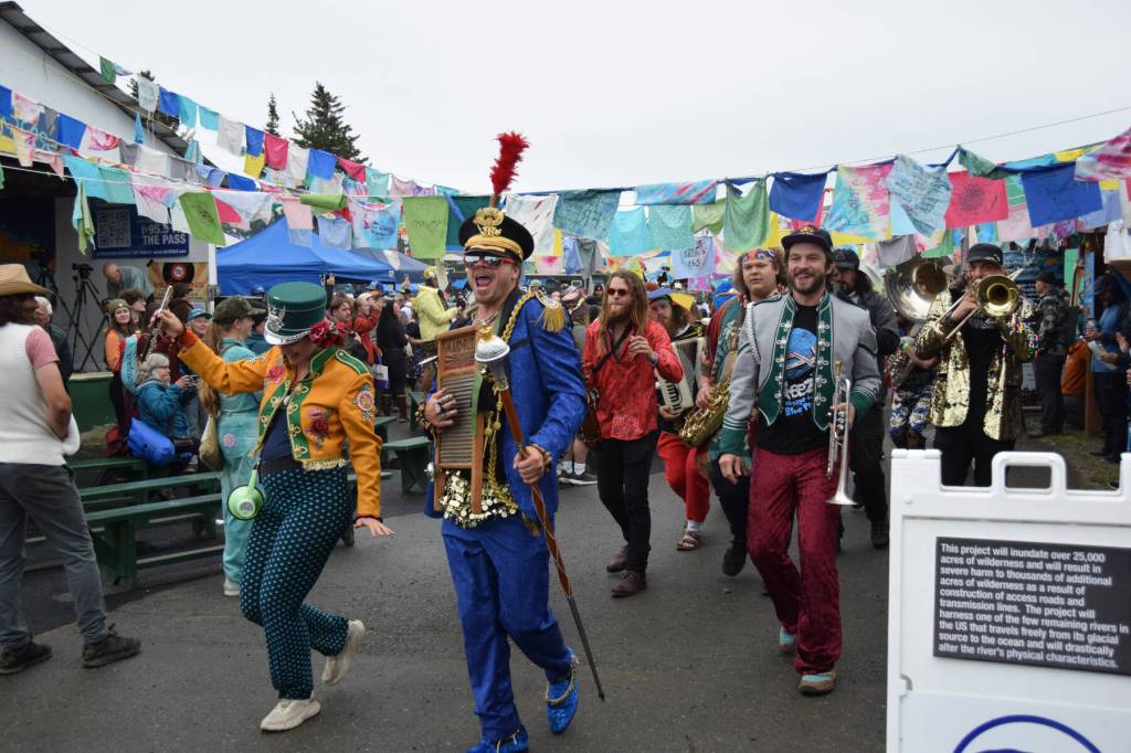 The Parkstrippers Marching Band parades through the Causeway during Salmonfest on Saturday, Aug. 2, 2025, at the Kenai Peninsula Fairgrounds in Ninilchik, Alaska. (Delcenia Cosman/Homer News)