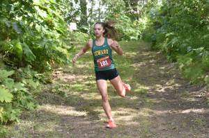 Seward's Olive Jordan runs to victory in the freshmen-sophomore girls race at the Kenai/Nikiski Class Races on Monday, Aug. 18, 2025, at Nikiski Middle-High School in Nikiski, Alaska. (Photo by Jeff Helminiak/Peninsula Clarion)