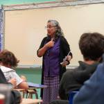 Lara Lindeman greets students on the first day of the 2025-2026 school year at Nikiski Middle/High School in Nikiski, Alaska, on Wednesday, Aug. 20, 2025. (Jake Dye/Peninsula Clarion)