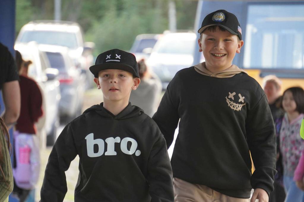Students walk through the entryway of Nikiski North Star Elementary School in Nikiski, Alaska, on the first day of the 2025-2026 school year on Wednesday, Aug. 20, 2025. (Jake Dye/Peninsula Clarion)