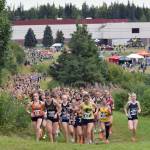 Services Talia Smith leads the girls varsity pack near the start of the Ted McKenney XC Invitational on Saturday, Aug. 23, 2025, at Tsalteshi Trails just outside of Soldotna, Alaska. (Photo by Jeff Helminiak/Peninsula Clarion)