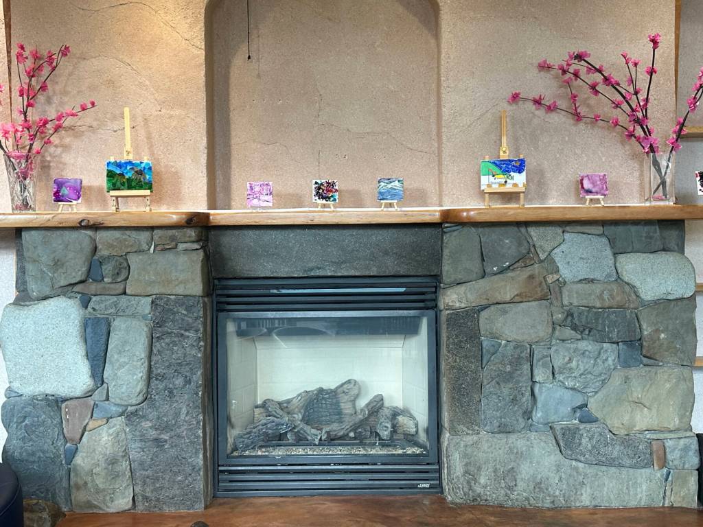Artwork by artists participating in the Independent Living Centers Artability program is on display through September in the Homer Public Librarys Fireplace Reading Lounge in Homer, Alaska. Photo by Christina Whiting