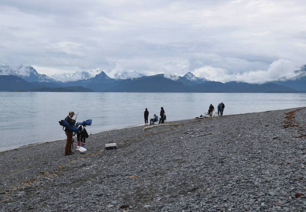 Salmon anglers prepare for fishing at the Lands End beach on the Homer Spit. (Homer News file photo)