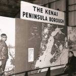 In this old Cheechako News photo, officials consider an early display map of the Kenai Peninsula Borough, 1969.
