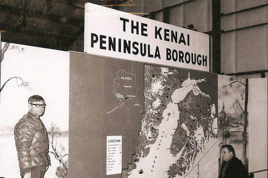 In this old Cheechako News photo, officials consider an early display map of the Kenai Peninsula Borough, 1969.