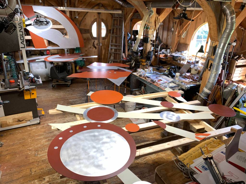 Four Worlds is a 48-foot long brushed and painted aluminum exterior wall piece created by Jeff Dean and on display at the Dean Gallery in Homer, Alaska. Photo provided by Jeff Dean