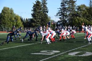 The Homer Mariners varsity football team faces the Kenai Central High School Kardinals on Friday, Aug. 29, 2025, at the Homer High School football field in Homer, Alaska. (Delcenia Cosman/Homer News)