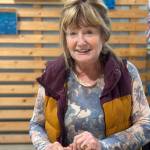 Artist Rosemary Rozzi Redmond shows a series of acrylic paintings with fishing themes at Grace Ridge Brewing in Homer, Alaska. The exhibit is open through September 2025. Photo by Christina Whiting