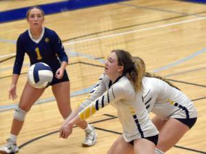 Homers Reilly Sue Baker digs up a ball against Soldotna on Tuesday, Sept. 9, 2025, at Soldotna High School in Soldotna, Alaska. (Photo by Jeff Helminiak/Peninsula Clarion)