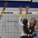 Soldotnas Morgan Simac attacks against Homers Jaelynn Kennon and Alysha Nyvall on Tuesday, Sept. 9, 2025, at Soldotna High School in Soldotna, Alaska. (Photo by Jeff Helminiak/Peninsula Clarion)
