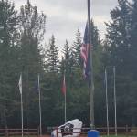 The American and Alaska flags are set at half-mast in honor of Patriot Day on Thursday, Sept. 11, 2025, at the VFW Post 10221 in Anchor Point, Alaska. (Delcenia Cosman/Homer News)