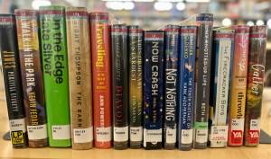 Selections from the 2025 Lit Lineup are lined up on a shelf at the Homer Public Library on Friday, Jan. 2, 2025, in Homer, Alaska. Photo by Christina Whiting