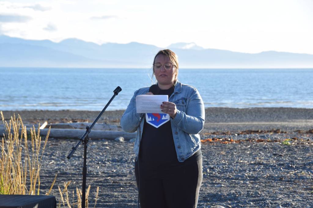 Cat Cushway, a founder of Revive Academy in Homer, Alaska, speaks during a vigil for Charlie Kirk on Wednesday, Sept. 17, 2025, at Mariner Park on the Homer Spit. (Chloe Pleznac/Homer News)