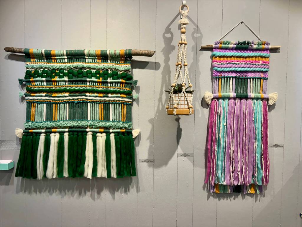 Wall hangings by Chelsea Carpenter are on display in Homer Council on the Arts Fabricated exhibit in Homer, Alaska. Photo by Christina Whiting