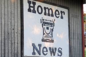 The Homer News sign hangs on the outside of the newspaper's former office building on Landings Street on Thursday, Oct. 17, 2024, in Homer, Alaska. (Delcenia Cosman/Homer News)