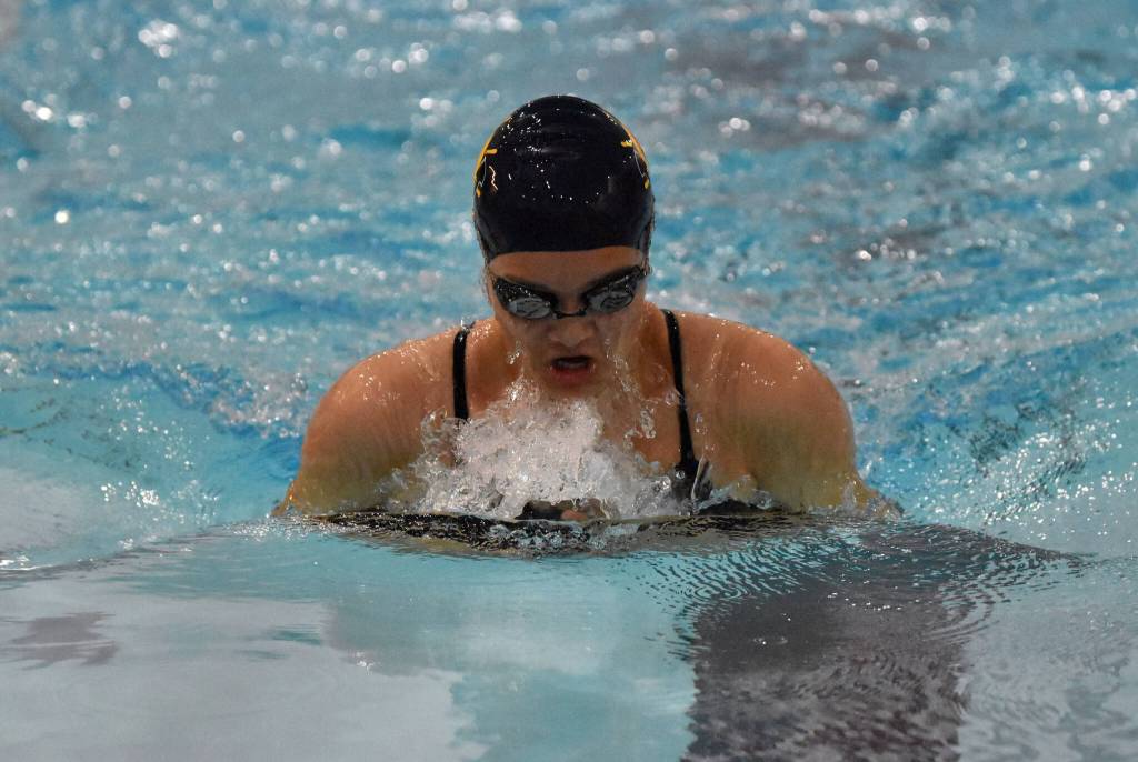 Homers Marina Co competes in the 100-yard breaststroke at the Kenai Invitational at Kenai Central High School on Saturday, Sept. 20, 2025, in Kenai, Alaska. (Photo by Jeff Helminiak/Peninsula Clarion)