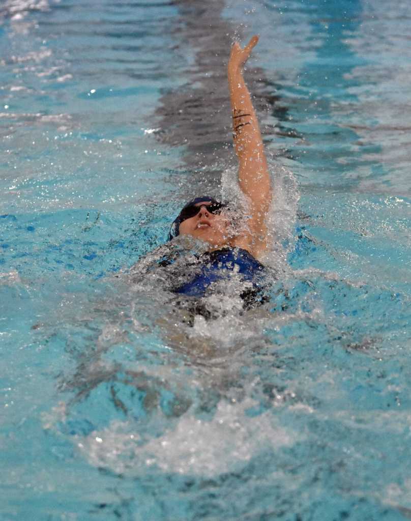 Soldotnas Zoe Burns competes in the 100-yard backstroke at the Kenai Invitational at Kenai Central High School on Saturday, Sept. 20, 2025, in Kenai, Alaska. (Photo by Jeff Helminiak/Peninsula Clarion)